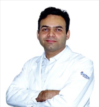 Dr. Dinesh Rattnani